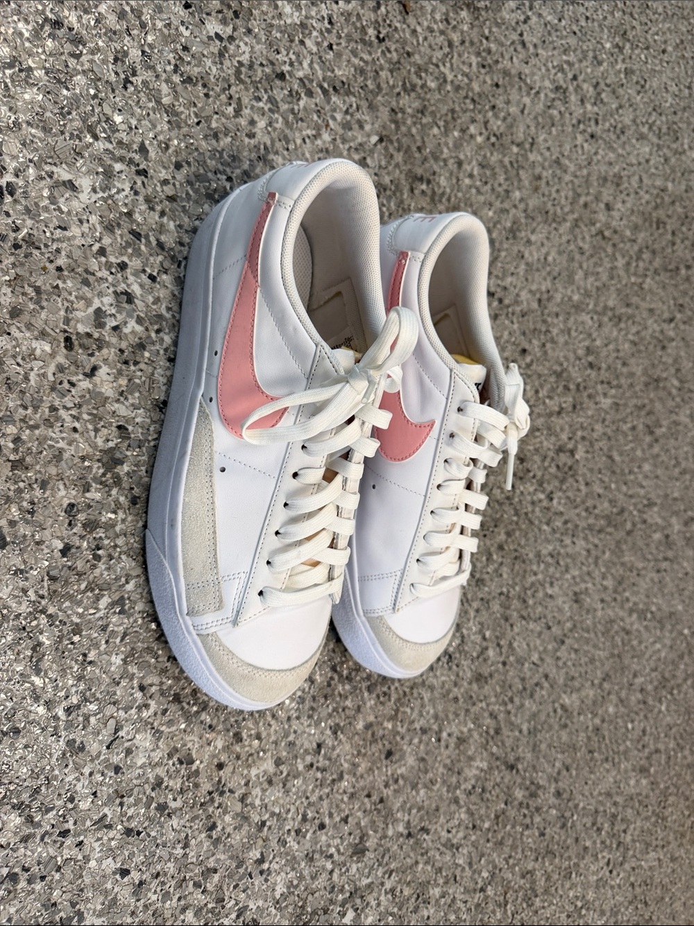 Nike Women’s White Low-Top Sneakers with Pink Swoosh